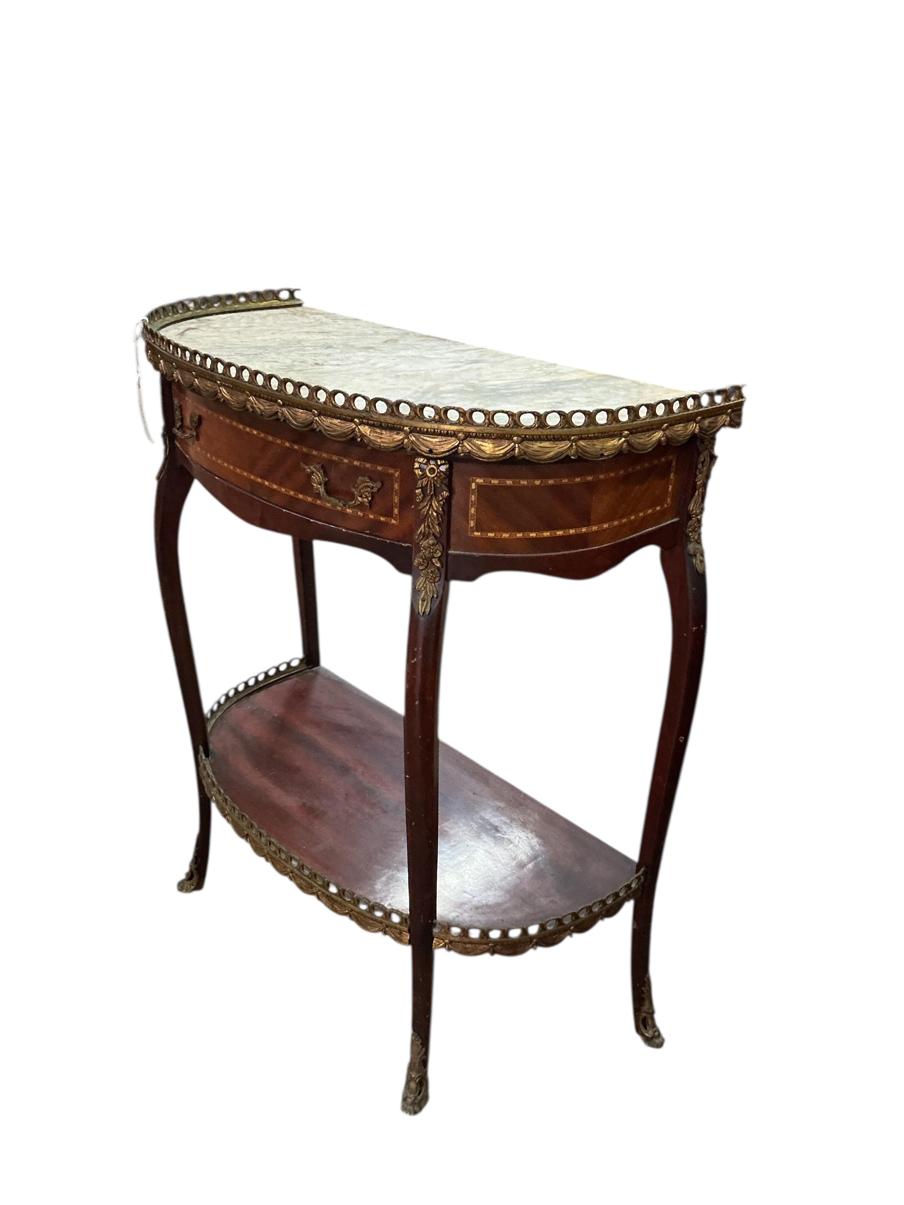 A Louis XVI style D shape marble top gilt metal mounted two tier table, width 64cm, depth 31cm, height 73cm